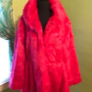 Neon pink woman’s fur coat